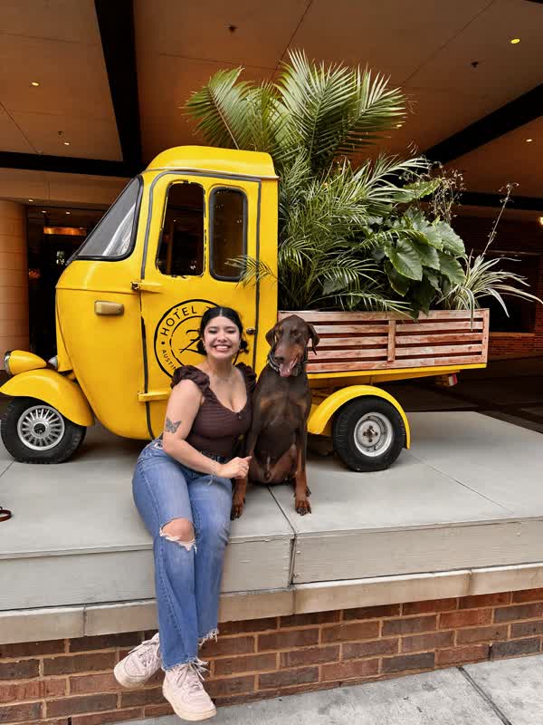 Diana with dog at hotel